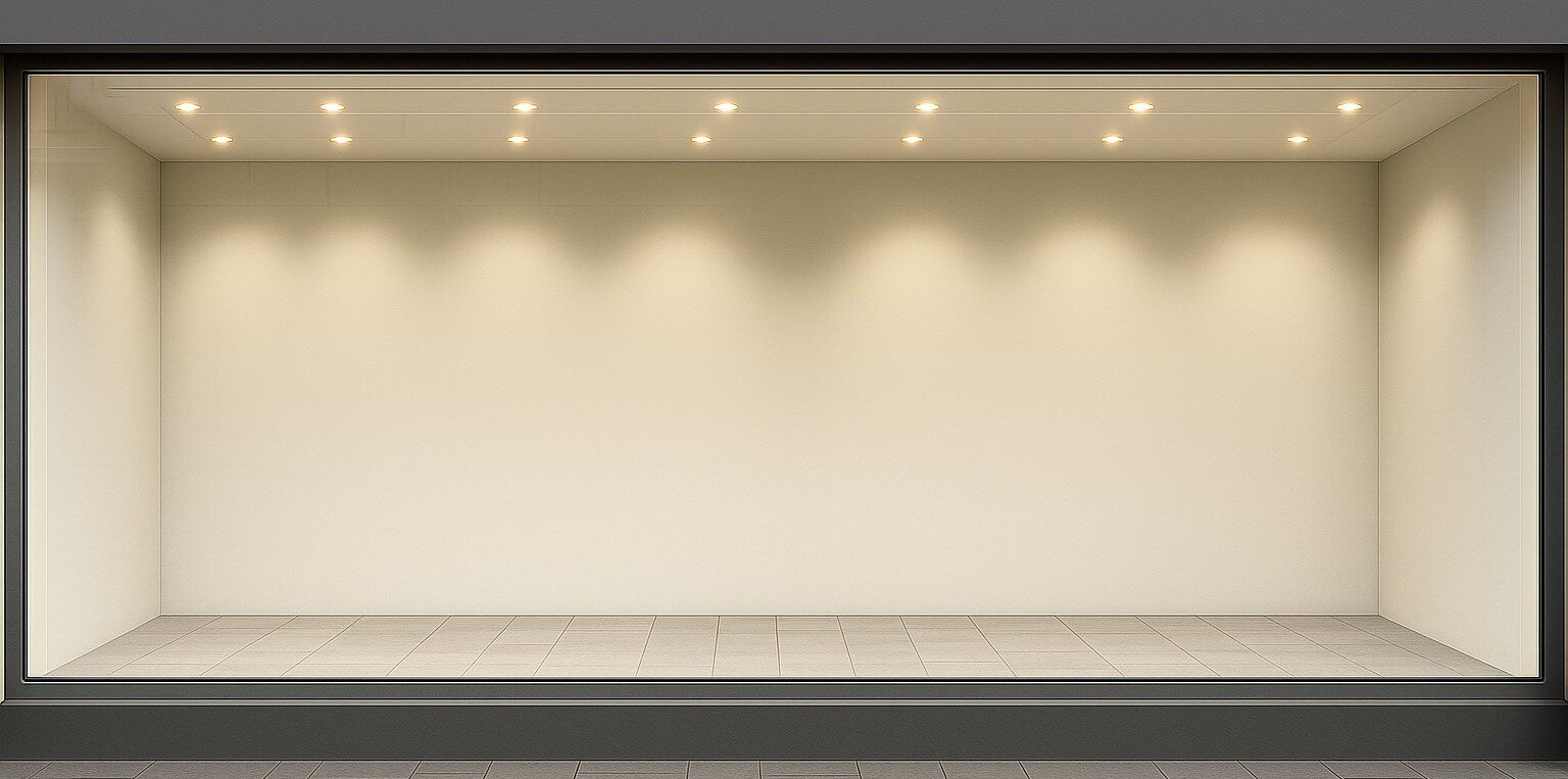 A modern storefront with large glass windows, repaired by OhMyGlass